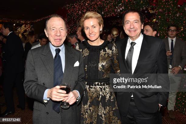 Anthony Haden-Guest, John Paulson and Jenny Paulson attend A Christmas Cheer Holiday Party 2017 Hosted by George Farias, Anne and Jay McInerney at...