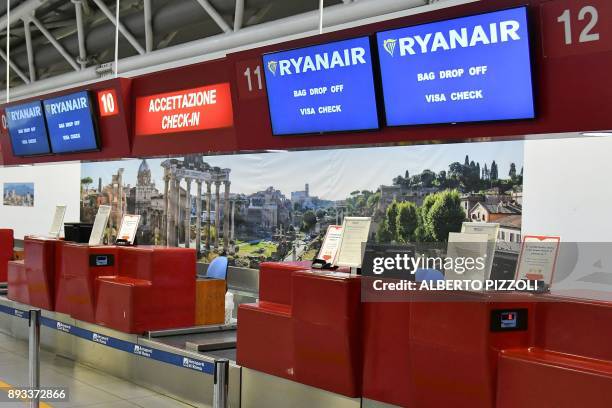 Picture shows the check-in desk Ryanair on December 15, 2017 at Rome's Ciampino airport. Ryanair has invited pilot unions across Europe for talks on...