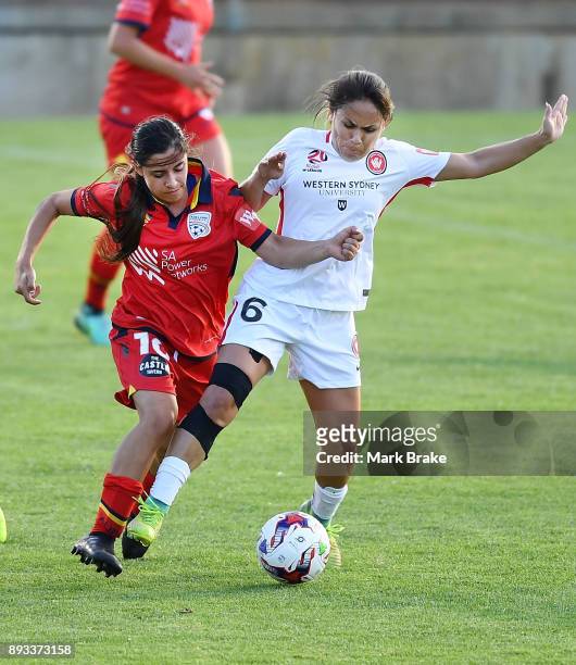 Alexandra Chidiac of Adelaide United competes with Lo'eau LaBonta of Western Sydney Wanderers FC during the round eight W-League match between...