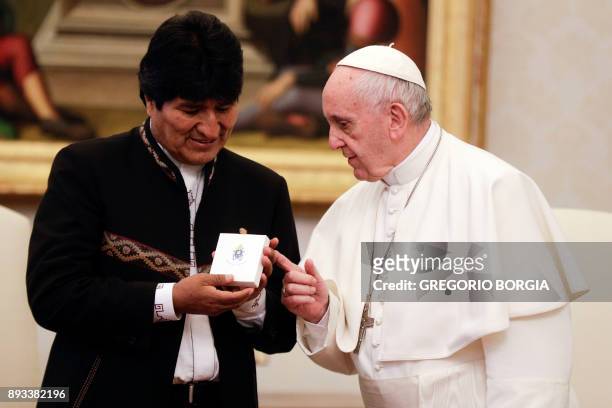 Pope Francis meets with President of Bolivia Evo Morales during a private audience at the Vatican, on December 15, 2017. / AFP PHOTO / POOL /...