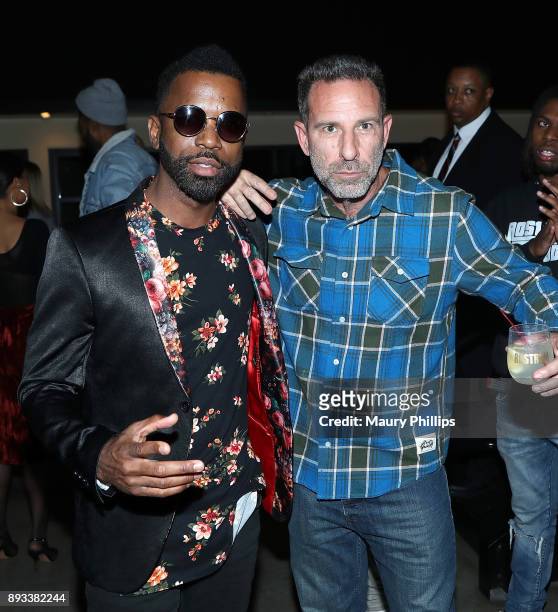 Moses Hill and Paul Stewart attend Rostrum Records 2017 holiday party on December 14, 2017 in Los Angeles, California.