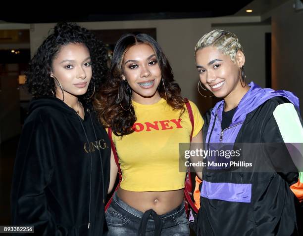 Saiyr, Zeuie and Emaza Gibson of Ceraadi attend Rostrum Records 2017 holiday party on December 14, 2017 in Los Angeles, California.
