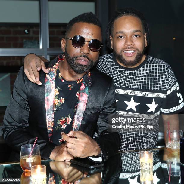Moses Hill and Jarel Green attend Rostrum Records 2017 holiday party on December 14, 2017 in Los Angeles, California.
