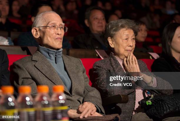 Chinese poet Yu Guangzhong and his wife attend an award ceremony on December 29, 2013 in Haikou, Hainan Province of China. Chinese poet Yu Guangzhong...