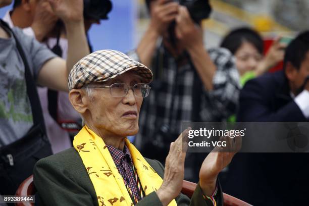 Chinese poet Yu Guangzhong visits Laojunshan Mountain on June 1, 2014 in Luoyang, Henan Province of China. Chinese poet Yu Guangzhong died on...