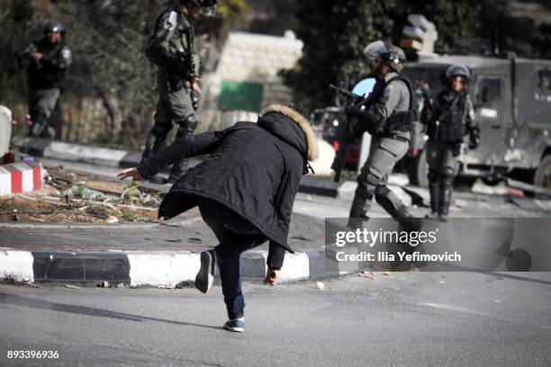 Man starts to fall after being shot by soldiers after he went on a stabbing attack in the area on December 15, 2017 in Ramallah, West Bank. Reports...