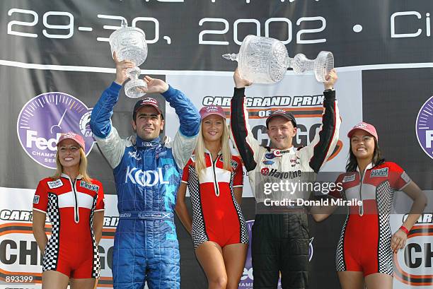 Cristiano da Matta celebrates with and third placed Dario Franchitti winning the Grand Prix of Chicago round 7 of the CART FedEx Championship Series...