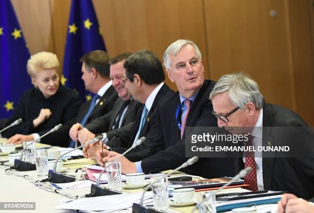 S chief Brexit negotiator Michel Barnier and EU Commission President Jean Claude Juncker arrive for a meeting with European Union leaders on Brexit...