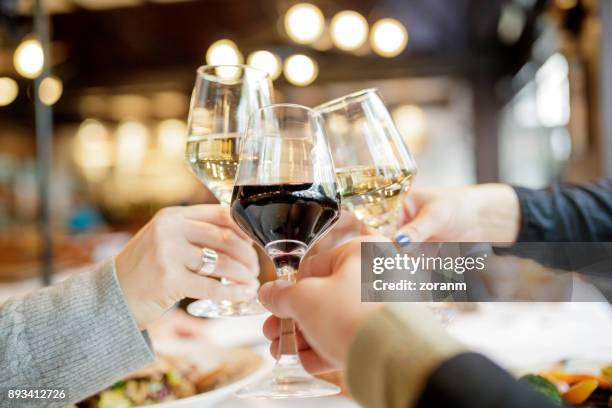 personal point of view of wine toasting - celebratory toast stock pictures, royalty-free photos & images