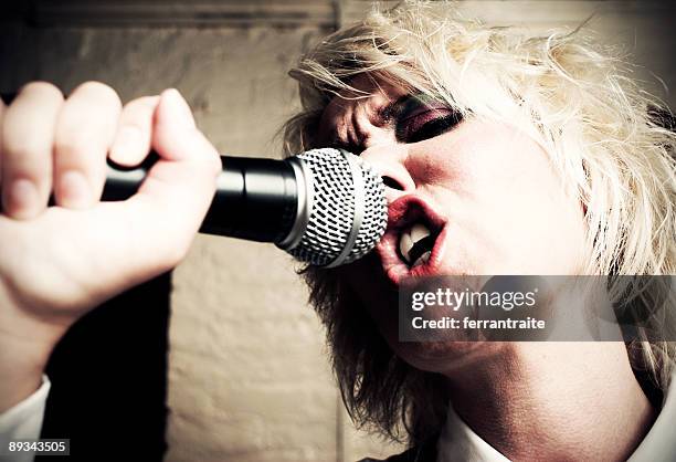 punk singer. - lounge singer stock pictures, royalty-free photos & images