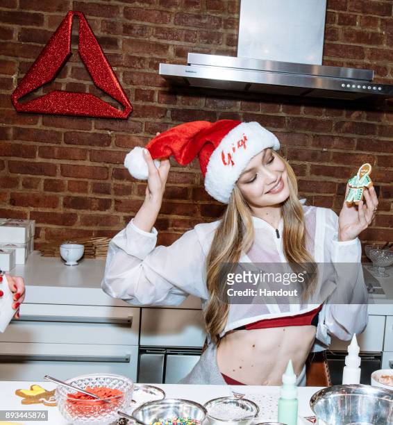 In this handout image provided by Reebok, style icon and Reebok ambassador Gigi Hadid hosts an intimate holiday celebration, joined by her closest...