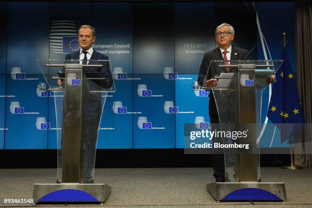 Donald Tusk, president of the European Union , left, speaks as Jean-Claude Juncker, president of the European Commission, looks on during a news...