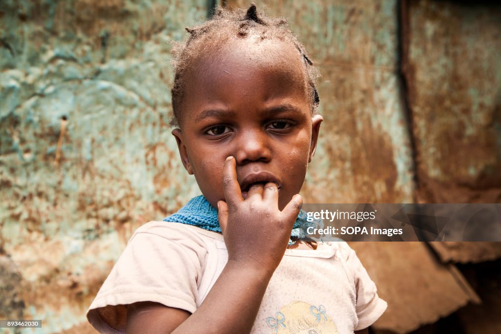 Portrait of a young child at the school's backyard.
Ngota's...