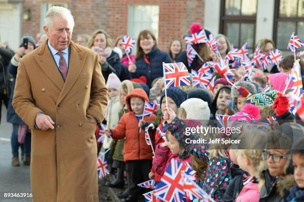 The Prince of Wales, Charles, tours Ramsbury Estate on December 15, 2017 in Marlborough, England. During his visit he met local school children and...