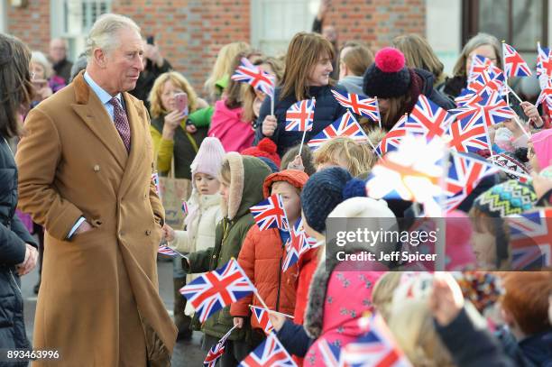 The Prince of Wales, Charles, tours Ramsbury Estate on December 15, 2017 in Marlborough, England. During his visit he met local school children and...