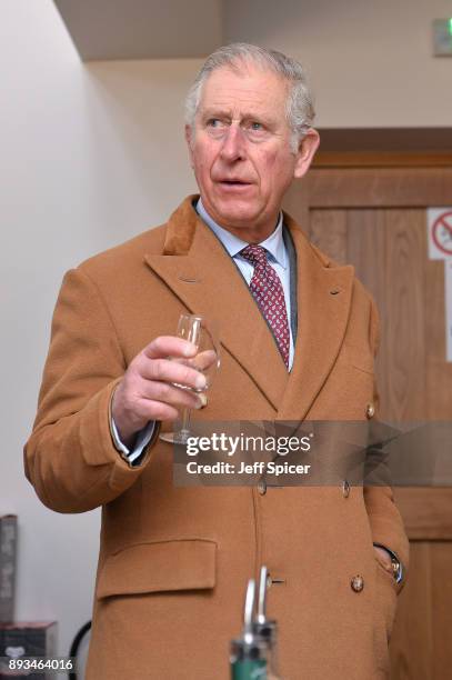 The Prince of Wales, Charles, tours Ramsbury Estate on December 15, 2017 in Marlborough, England. During his visit he met local school children and...