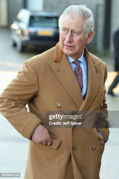 The Prince of Wales, Charles, tours Ramsbury Estate on December 15, 2017 in Marlborough, England. During his visit he met local school children and...