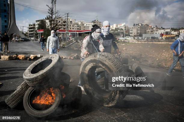 Palestinian men clash with IDF on December 15, 2017 in Jerusalem, Israel. Today is the tenth day of clashes in the West Bank, Jerusalem and Gaza...