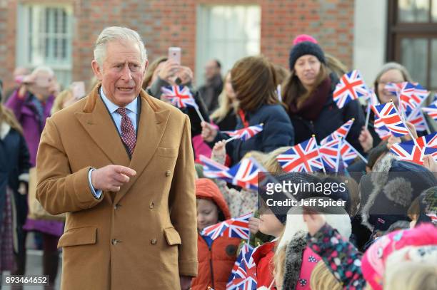 The Prince of Wales, Charles, tours Ramsbury Estate on December 15, 2017 in Marlborough, England. During his visit he met local school children and...