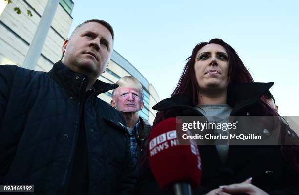 Britain First leader Paul Golding and deputy leader Jayda Fransen talk to the media outside Belfast Laganside Courts after Fransen was released on...
