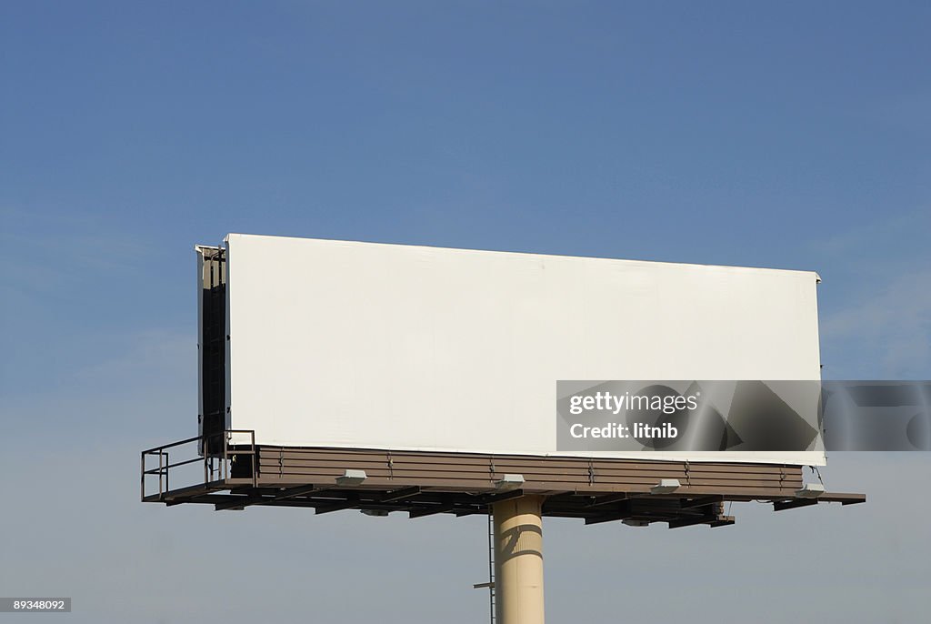A blank billboard high in the air