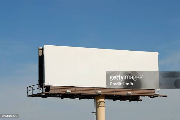 a blank billboard high in the air - billboard stock pictures, royalty-free photos & images