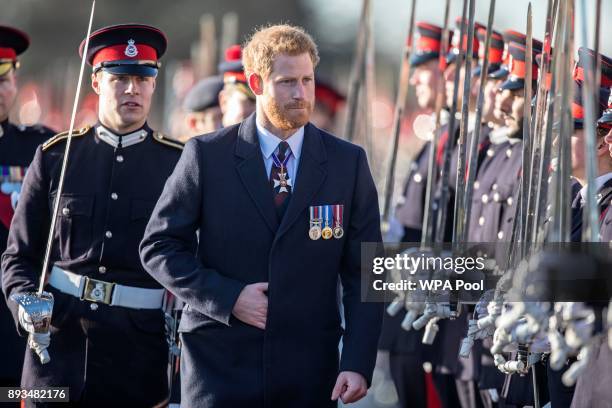Prince Harry inspects the graduating officer cadets at Sandhurst during the Sovereign's parade ceremony at Royal Military Academy Sandhurst on...