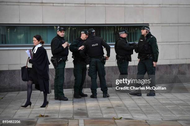 Police patrol the court vacinity at Belfast Laganside courts on December 15, 2017 in Belfast, Northern Ireland. Both Britain First leader Paul...