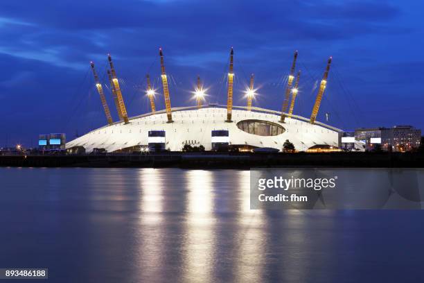 the o2 near thames river at blue hour (london/ uk) - the o2 england stock pictures, royalty-free photos & images