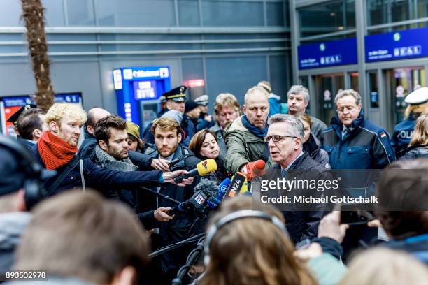 German Interior Minister Thomas de Maiziere talks to journalists during his visit to a project for automatic recognition of faces at trainstation...
