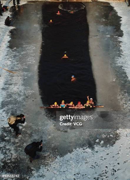 Aerial view of winter swimming enthusiasts swimming in the cold waters of Beiling Park on December 15, 2017 in Shengyang, Liaoning Province of China.