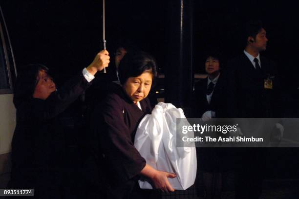Hitomi Soga, holds ashes of former U.S. Soldier and her husband Charles Jenkins at his funeral on December 14, 2017 in Sado, Niigata, Japan.