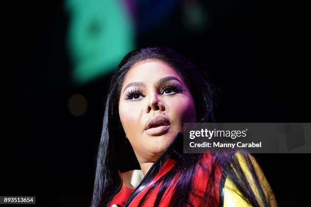 Lil Kim performs onstage at the 2017 Hot for the Holidays concert at Prudential Center on December 14, 2017 in Newark, New Jersey.