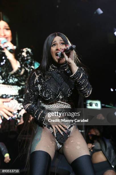 Cardi B performs onstage at the 2017 Hot for the Holidays concert at Prudential Center on December 14, 2017 in Newark, New Jersey.