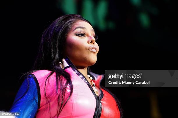 Lil Kim performs onstage at the 2017 Hot for the Holidays concert at Prudential Center on December 14, 2017 in Newark, New Jersey.