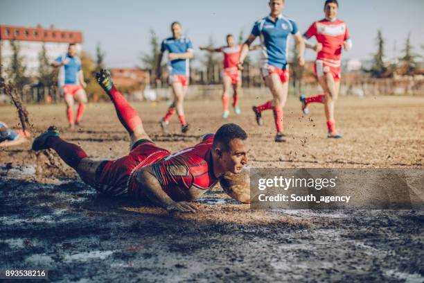 breaking the tackle - rugby tackling stock pictures, royalty-free photos & images