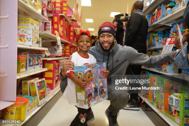 Anthony Davis of the New Orleans Pelicans participates in his annual Christmas shopping spree for children selected from non-profit groups such as...