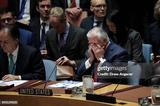 Secretary of State Rex Tillerson rubs his eyes during a United Nations Security Council meeting concerning North Korea's nuclear ambitions, December...