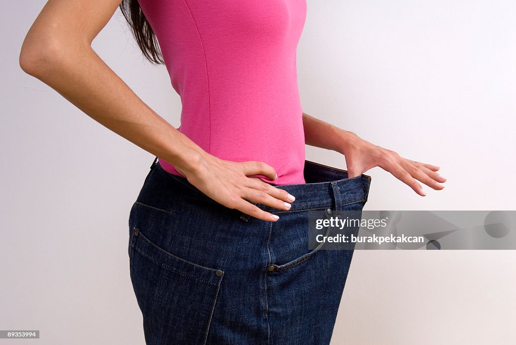 Frau mit großen jeans, Ernährung