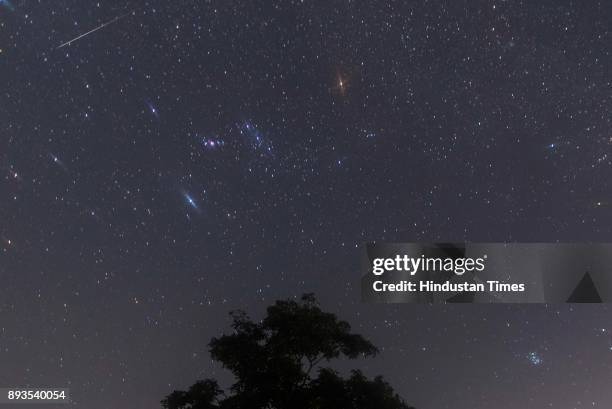 Geminid meteor shower seen from Pawna Lake near Lonavala, on December 14, 2017 in Mumbai, India. This year the Geminid meteor shower is predicted to...