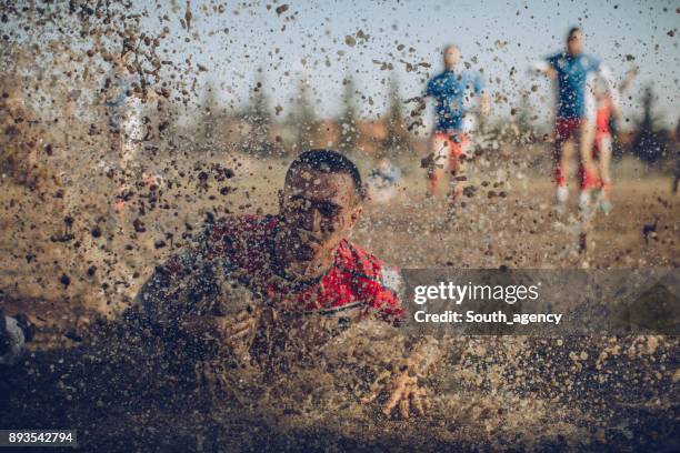 dirty game - mud stock pictures, royalty-free photos & images