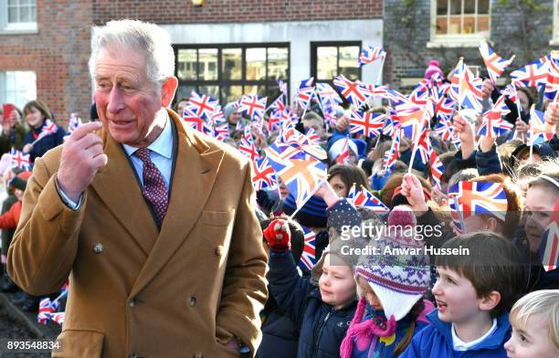 Prince Charles, Prince of Wales meets local school children in the village of Ramsbury on December 15, 2017 in Marlborough, England.