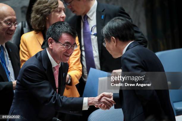 Foreign Minister of Japan Taro Kono shakes hands with South Korean Vice Foreign Minister Cho Hyun during a United Nations Security Council meeting...
