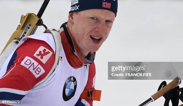 Norway's Johannes Thingnes Boe competes in the men's 10 km sprint event at the IBU World Cup Biathlon in Le Grand Bornand, on December 15, 2017. /...