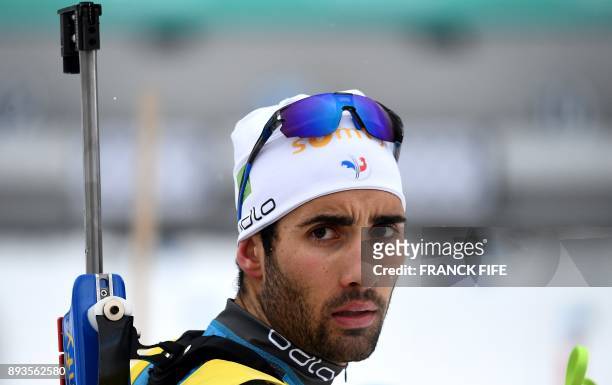 France's Martin Fourcade competes in the men's 10 km sprint event at the IBU World Cup Biathlon in Le Grand Bornand, on December 15, 2017. / AFP...