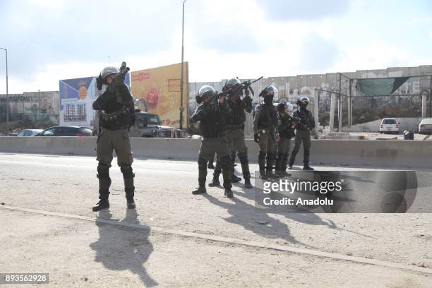 Israeli security forces intervene Palestinians as they gather to stage a protest against U.S. President Donald Trumps announcement to recognize...