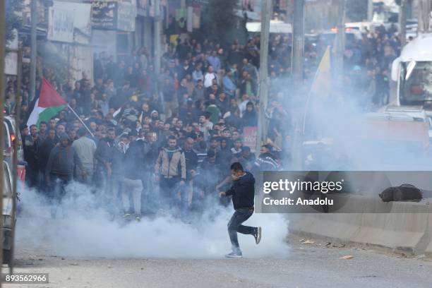 Israeli security forces intervene Palestinians as they gather to stage a protest against U.S. President Donald Trumps announcement to recognize...