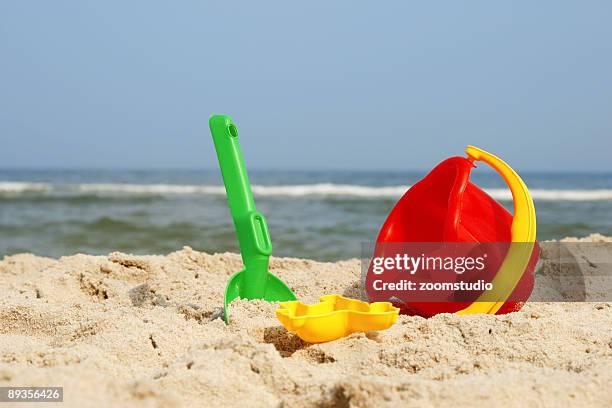 beach toys - beach bucket stock pictures, royalty-free photos & images