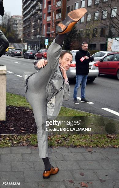 Belgian actor Jean-Claude Van Damme performs a karate kick during the European promotion tour of the new Amazon serie "Jean-Claude Van Johnson", on...