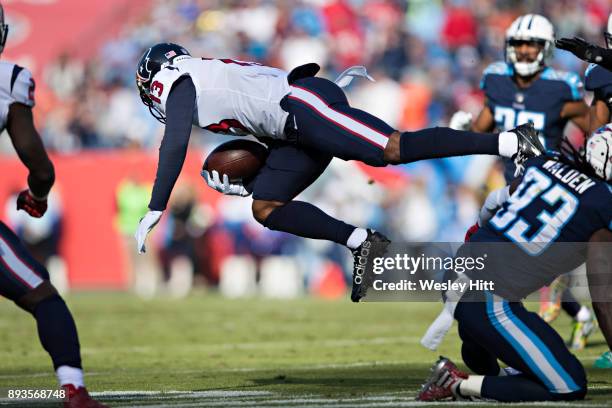 Braxton Miller of the Houston Texans is tripped up after during a game against the Tennessee Titans at Nissan Stadium on December 3, 2017 in...